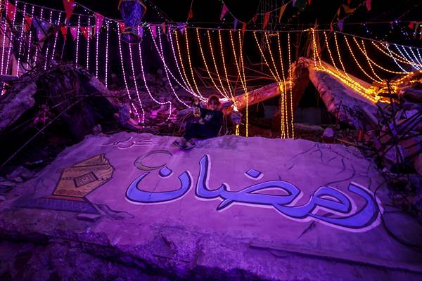 First sahur meal among the collapsed houses in Khan Yunis