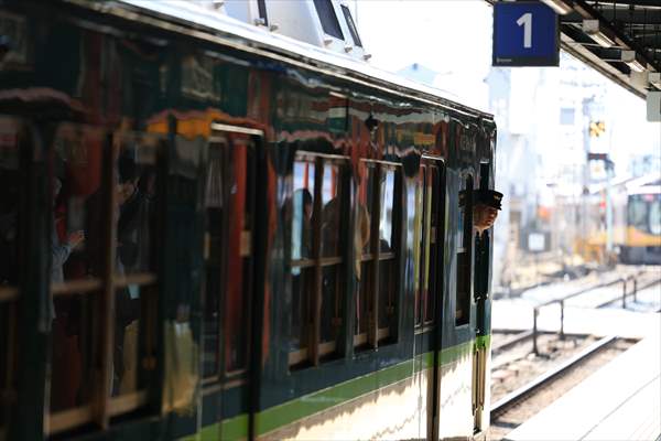 Fushimi Inari Shrine in Kyoto welcomes tourists and locals, reflecting daily life