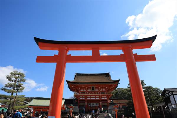 Fushimi Inari Shrine in Kyoto welcomes tourists and locals, reflecting daily life