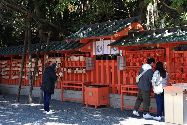 Fushimi Inari Shrine in Kyoto welcomes tourists and locals, reflecting daily life