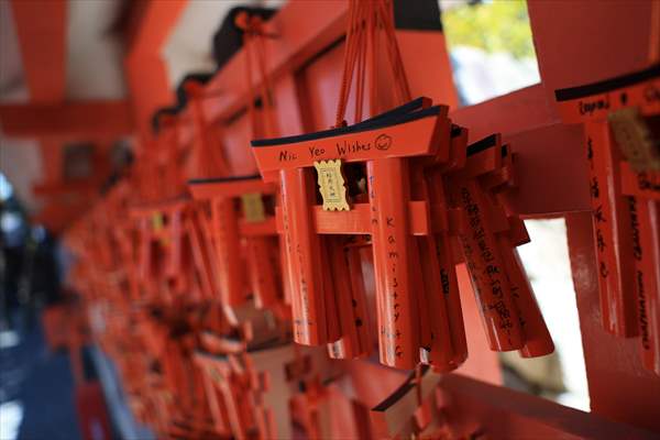 Fushimi Inari Shrine in Kyoto welcomes tourists and locals, reflecting daily life