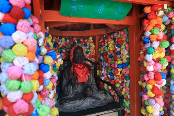 Fushimi Inari Shrine in Kyoto welcomes tourists and locals, reflecting daily life