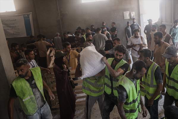 Flour aid distributed to Palestinians in Gaza under Israeli attacks