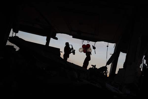 Volunteers dressed as Santa bring joy to children in Gaza