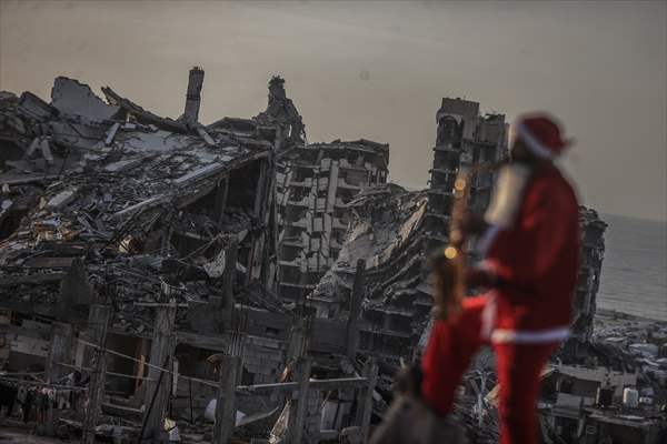 Volunteers dressed as Santa bring joy to children in Gaza