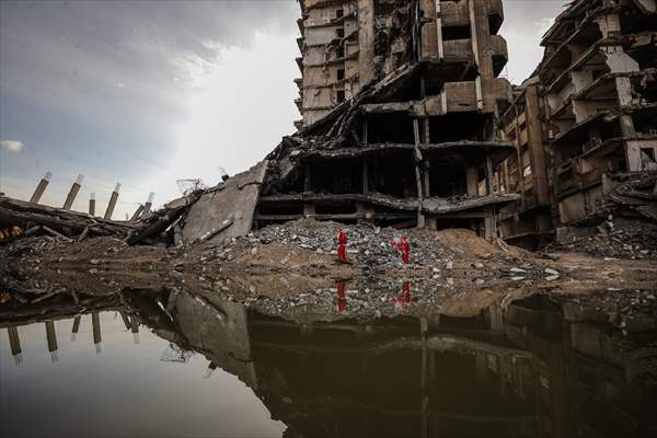 Volunteers dressed as Santa bring joy to children in Gaza