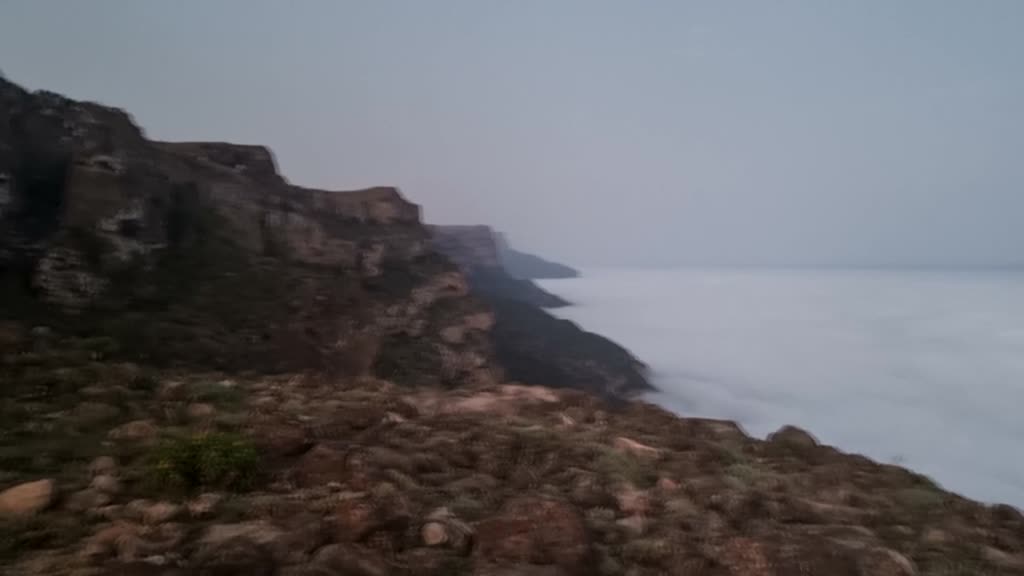 Mount Samhan hugs clouds in Zufar city of Oman