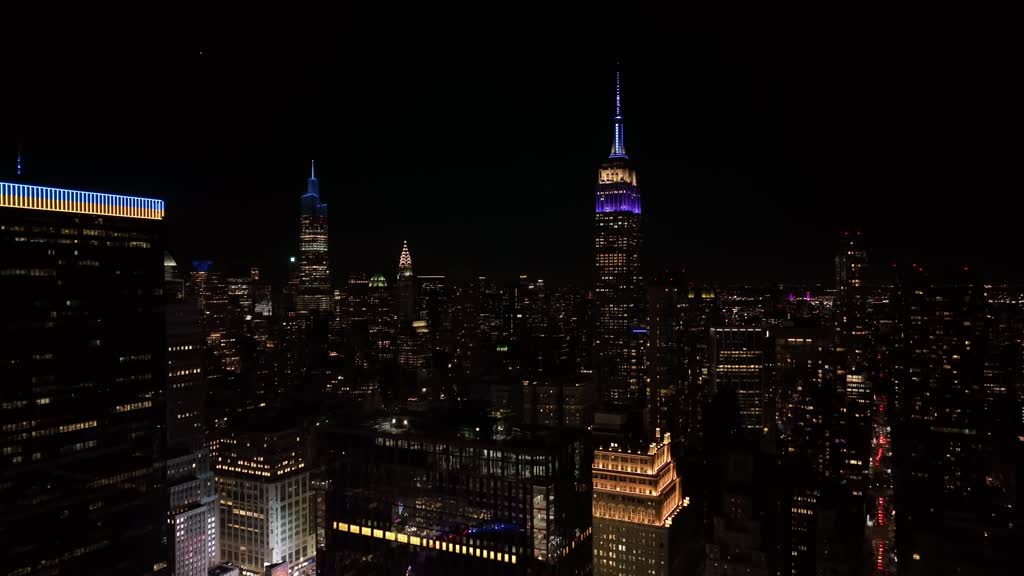 The Empire State Building lit up in purple for Queen Elizabeth II