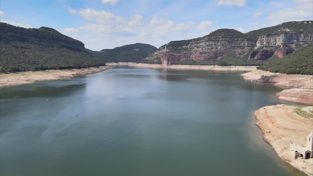 Ancient Roman ruins, submerged church resurface as drought shrinks reservoir in Spain