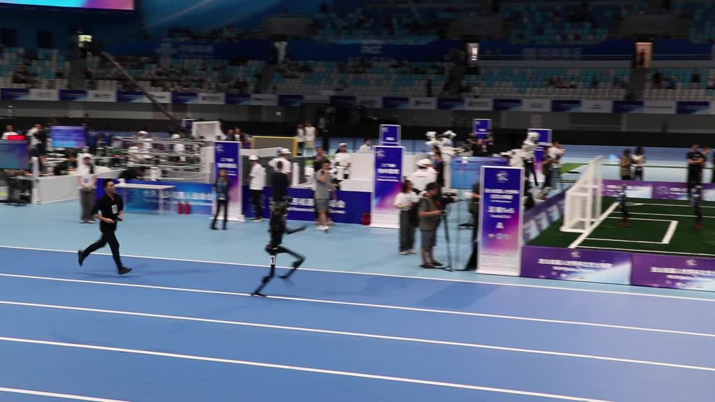 Beijing hosts first-ever humanoid robot games with football, boxing, running events