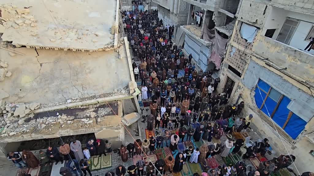 Gaza worshippers in Deir al-Balah mark Eid al-Fitr amid ruins of Ibn Taymiyyah Mosque