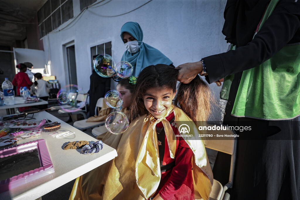 Volunteer hairdressers in Jarabulus cheer the Orphan girls