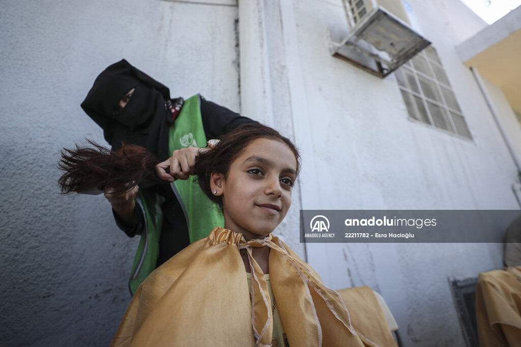 Volunteer hairdressers in Jarabulus cheer the Orphan girls