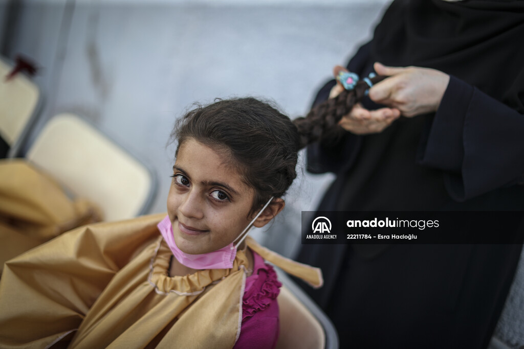 Volunteer hairdressers in Jarabulus cheer the Orphan girls