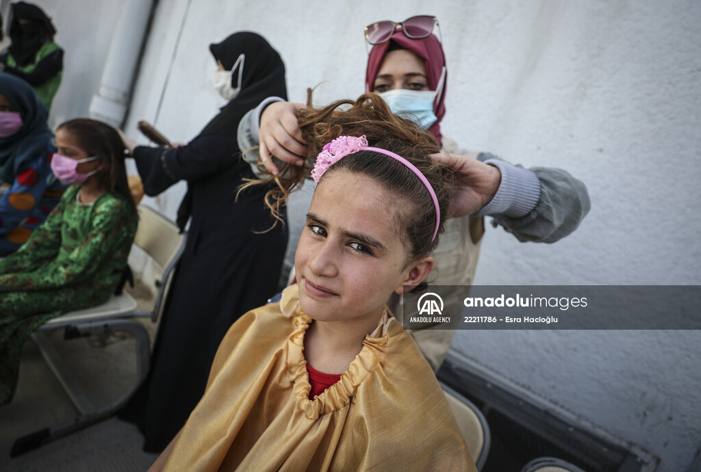 Volunteer hairdressers in Jarabulus cheer the Orphan girls