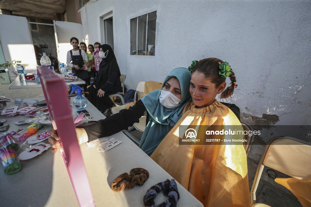 Volunteer hairdressers in Jarabulus cheer the Orphan girls