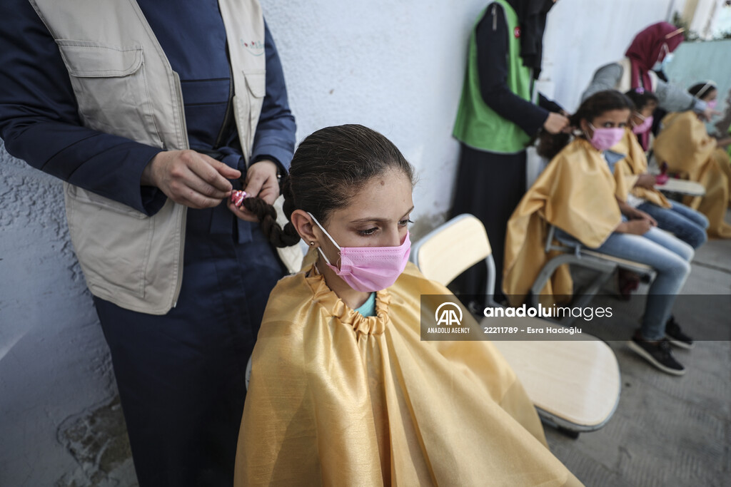 Volunteer hairdressers in Jarabulus cheer the Orphan girls