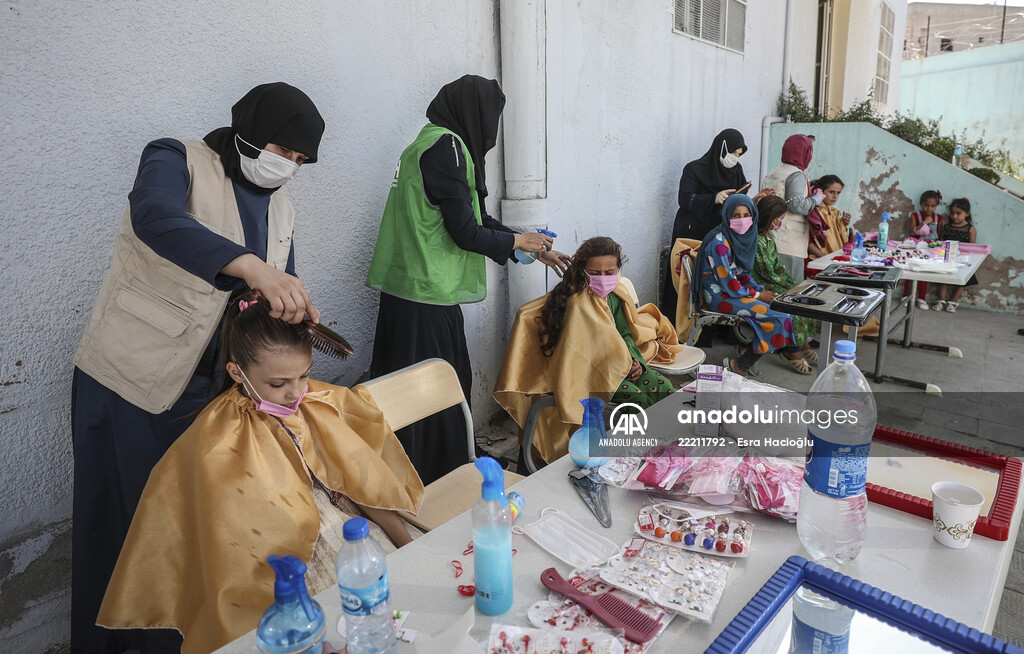 Volunteer hairdressers in Jarabulus cheer the Orphan girls