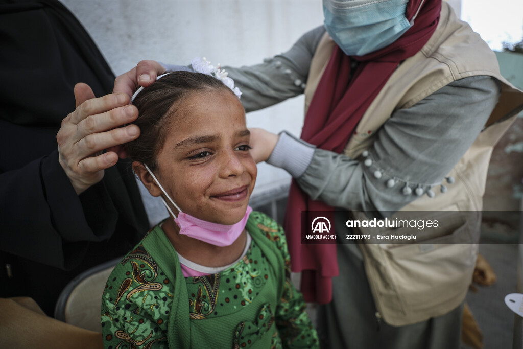 Volunteer hairdressers in Jarabulus cheer the Orphan girls