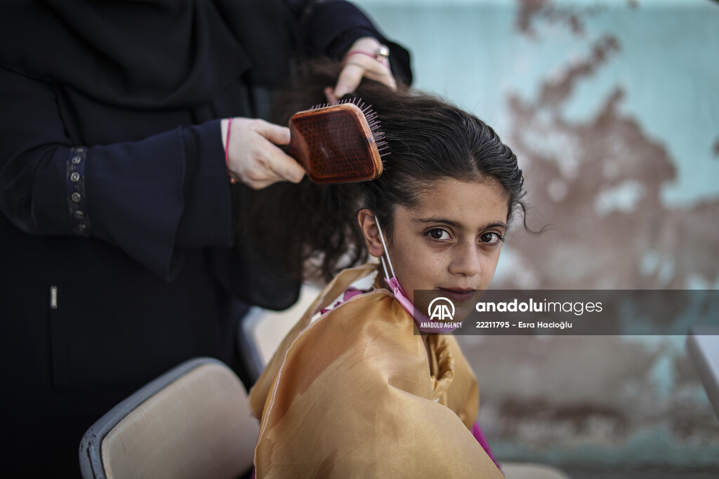 Volunteer hairdressers in Jarabulus cheer the Orphan girls