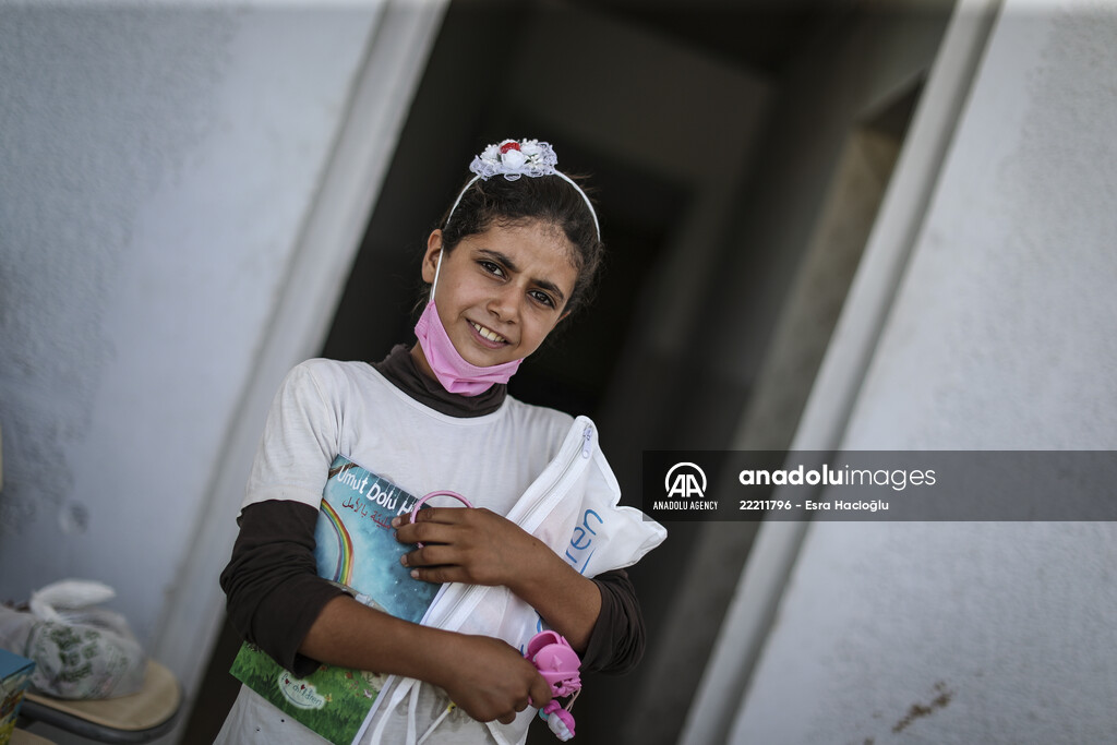 Volunteer hairdressers in Jarabulus cheer the Orphan girls