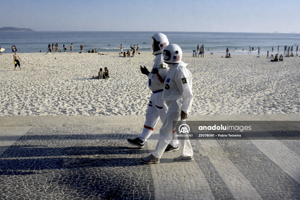 Astronauts at the coast of Rio