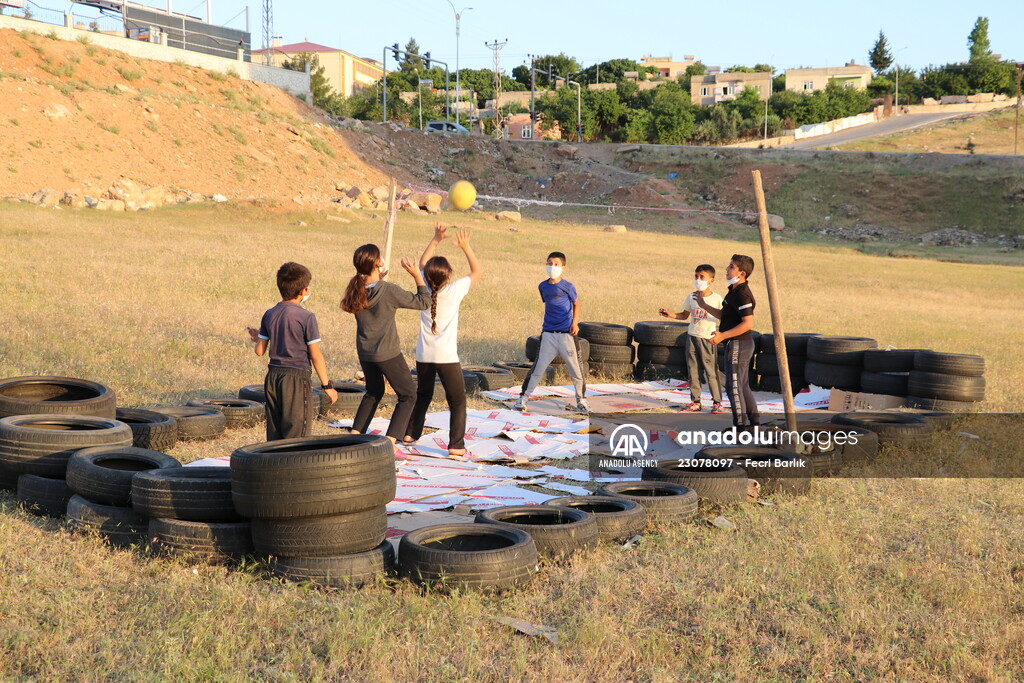 Volleyball court made of tires