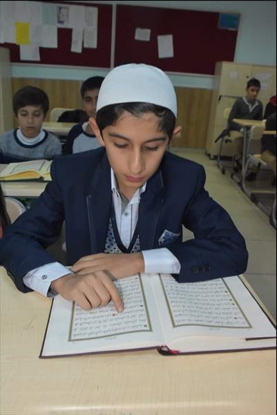 Babasının hafız olma hayalini oğlu gerçekleştirdi