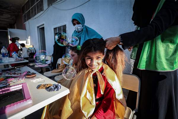 Volunteer hairdressers in Jarabulus cheer the Orphan girls