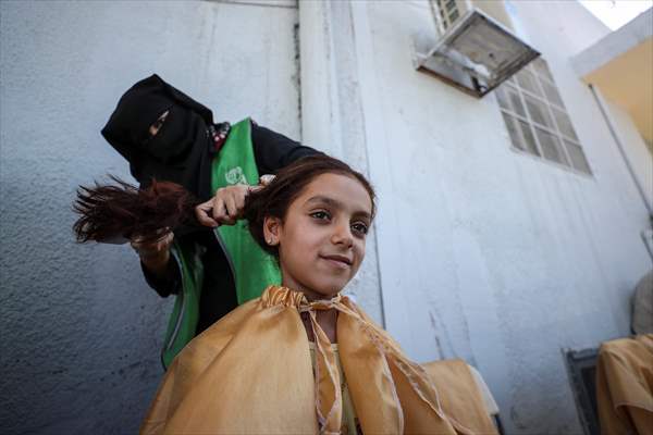 Volunteer hairdressers in Jarabulus cheer the Orphan girls