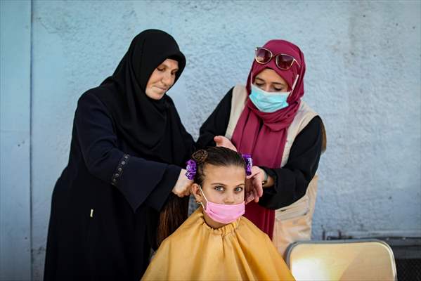 Volunteer hairdressers in Jarabulus cheer the Orphan girls
