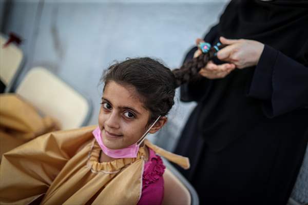 Volunteer hairdressers in Jarabulus cheer the Orphan girls