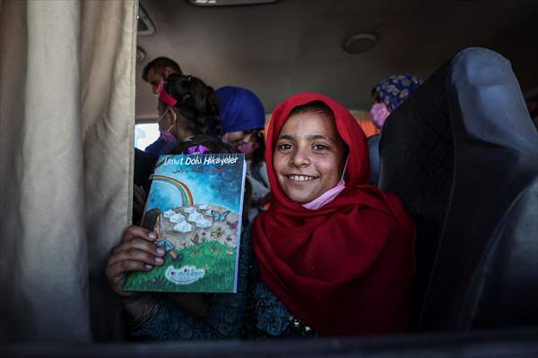 Volunteer hairdressers in Jarabulus cheer the Orphan girls