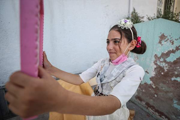 Volunteer hairdressers in Jarabulus cheer the Orphan girls