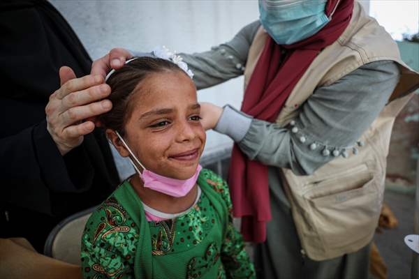 Volunteer hairdressers in Jarabulus cheer the Orphan girls