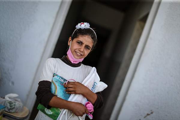 Volunteer hairdressers in Jarabulus cheer the Orphan girls