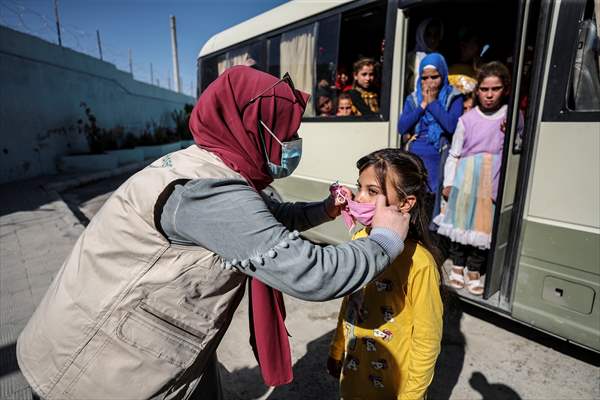 Volunteer hairdressers in Jarabulus cheer the Orphan girls
