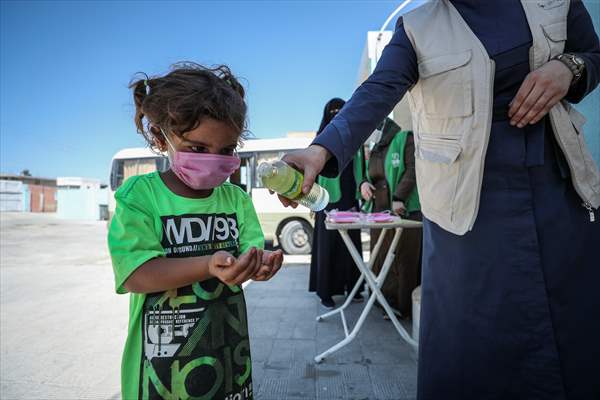 Volunteer hairdressers in Jarabulus cheer the Orphan girls