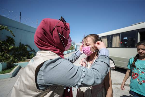 Volunteer hairdressers in Jarabulus cheer the Orphan girls