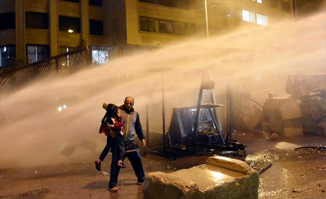 Father and son amid a police intervention